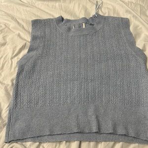 Blue sweater vest